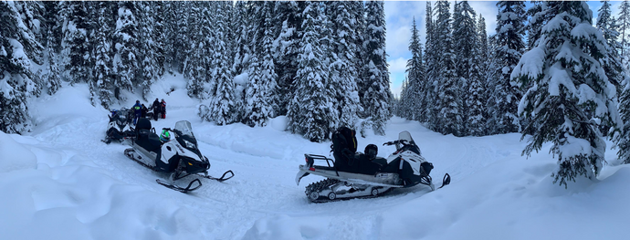 Snow mobiling up above the clouds in Canada